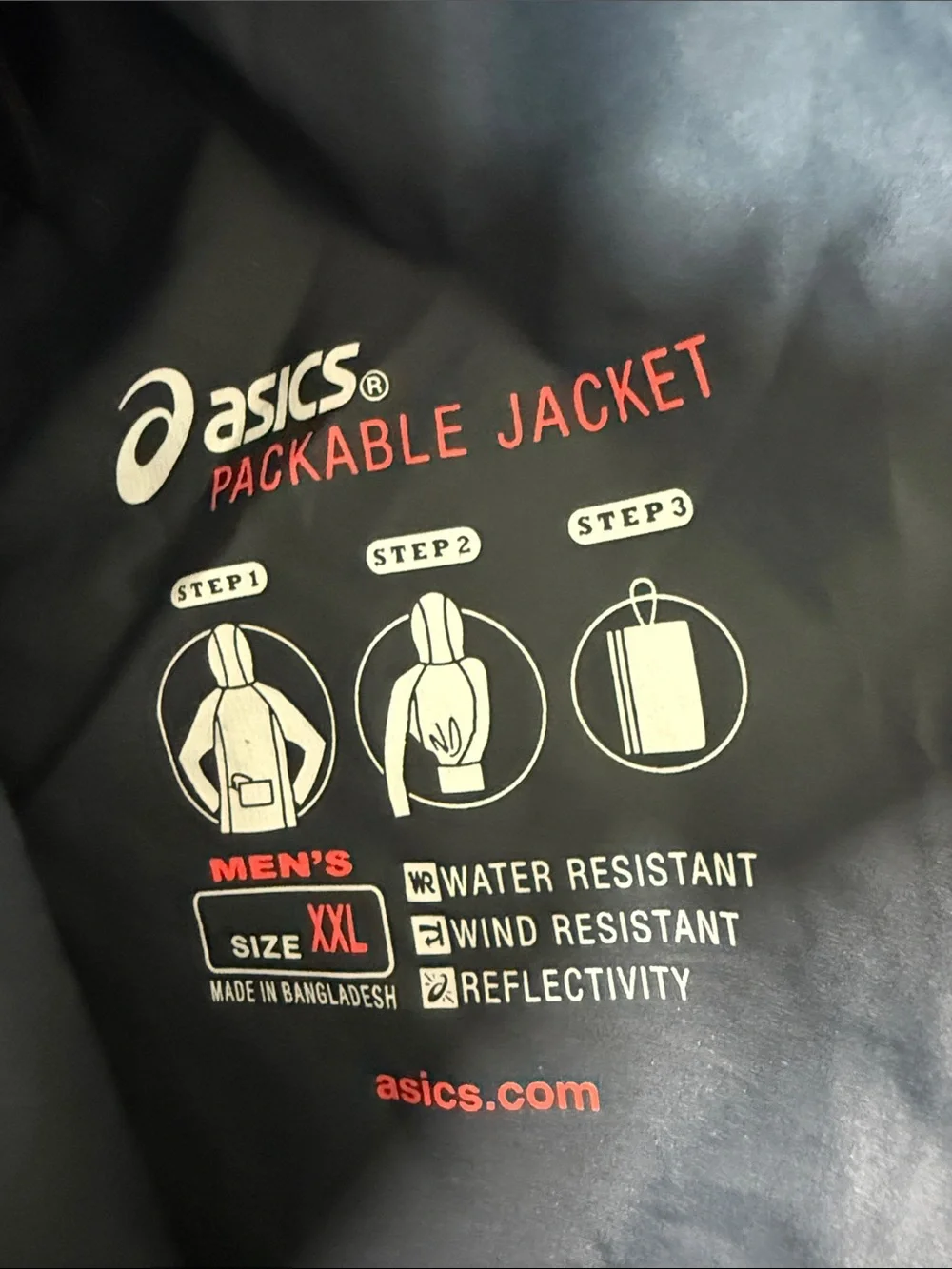 Asics packable jacket folds into pocket dark gray size XXL orange accents